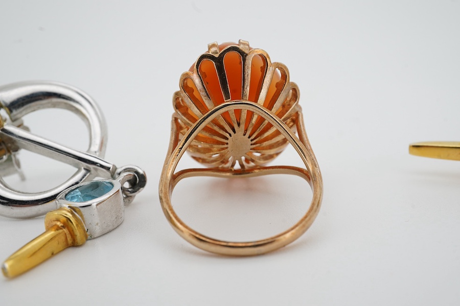 A 9ct gold shell cameo ring, size N, British hallmarks, gross weight 6 grams, and a pair of blue topaz and earrings, mounted in silver, length 5.1cm each, post fittings, Condition: good